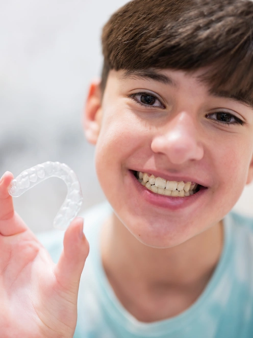 Clear aligners for teens at Bespoke Dental Newnan in Newnan, GA, designed for active lifestyles and growing smiles.